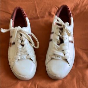 White Sneakers with Red Accents